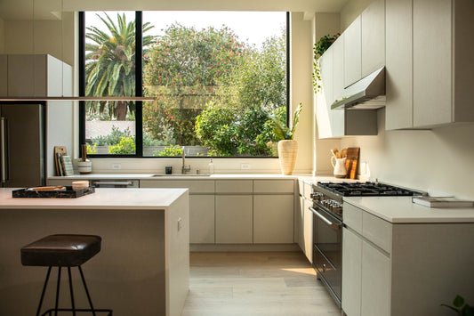 modern kitchen with island and large window