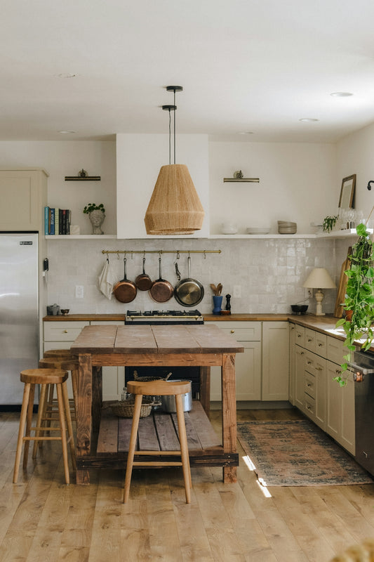 rustic kitchen with wooden island and stools