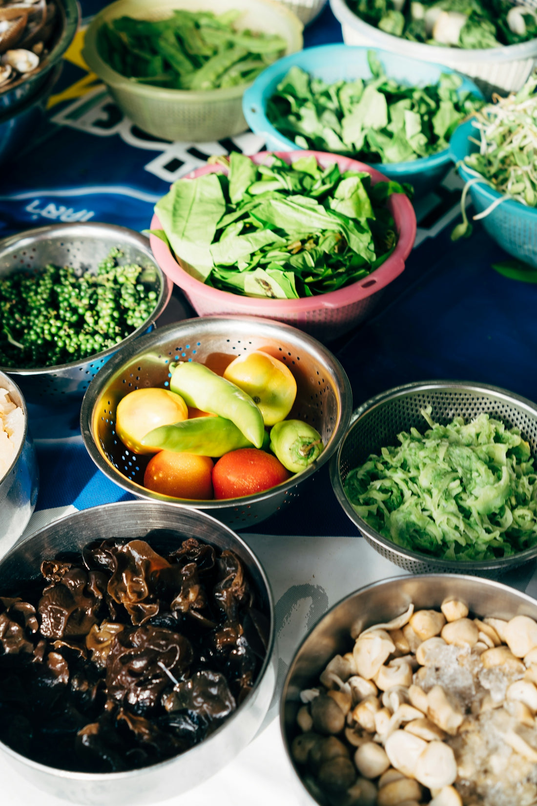 a group of bowls full of food